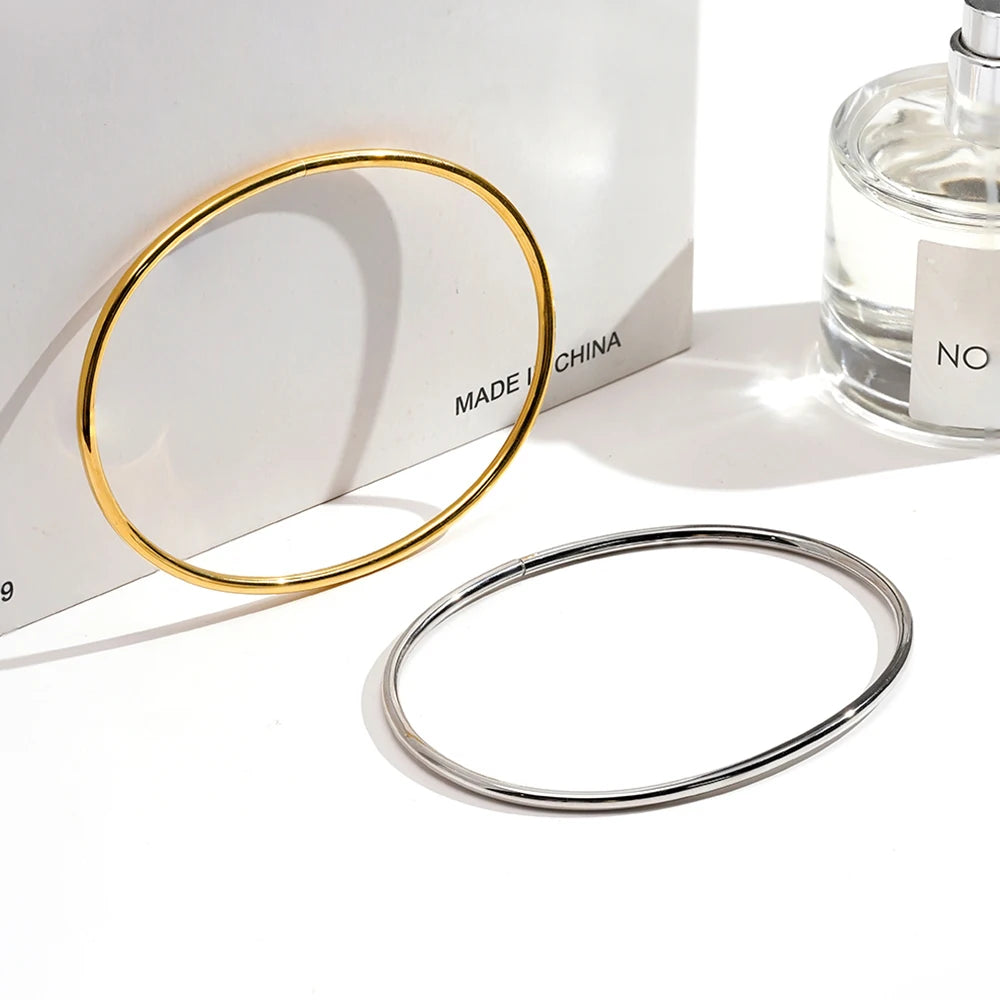 Tobillera Doble Banda Dorada Minimalista - Emeraldia Jewelry · Operado por R. E. dos Santos LTDA · CNPJ: 45.450.979/0001-38