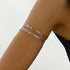 Brazalete de Brazo Abierto Dorado Cruzado Boho - Emeraldia Jewelry · Operado por R. E. dos Santos LTDA · CNPJ: 45.450.979/0001-38