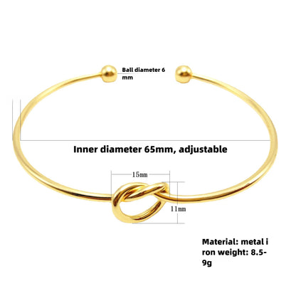 Brazalete Abierto Minimalista Nudo de Amor - Emeraldia Jewelry · Operado por R. E. dos Santos LTDA · CNPJ: 45.450.979/0001-38