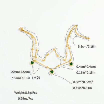 Tobillera Multicapa Corazón Esmeralda y Cristales - Emeraldia Jewelry · Operado por R. E. dos Santos LTDA · CNPJ: 45.450.979/0001-38