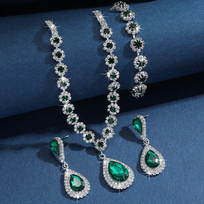 Conjunto de Joyería Nupcial Halo Azul Zafiro en Lágrima - Emeraldia Jewelry · Operado por R. E. dos Santos LTDA · CNPJ: 45.450.979/0001-38