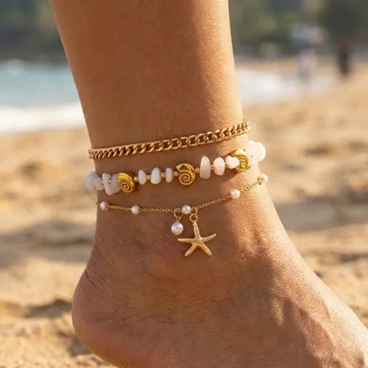 Tobillera Multicapa Estrella de Mar Verano Boho - Emeraldia Jewelry · Operado por R. E. dos Santos LTDA · CNPJ: 45.450.979/0001-38