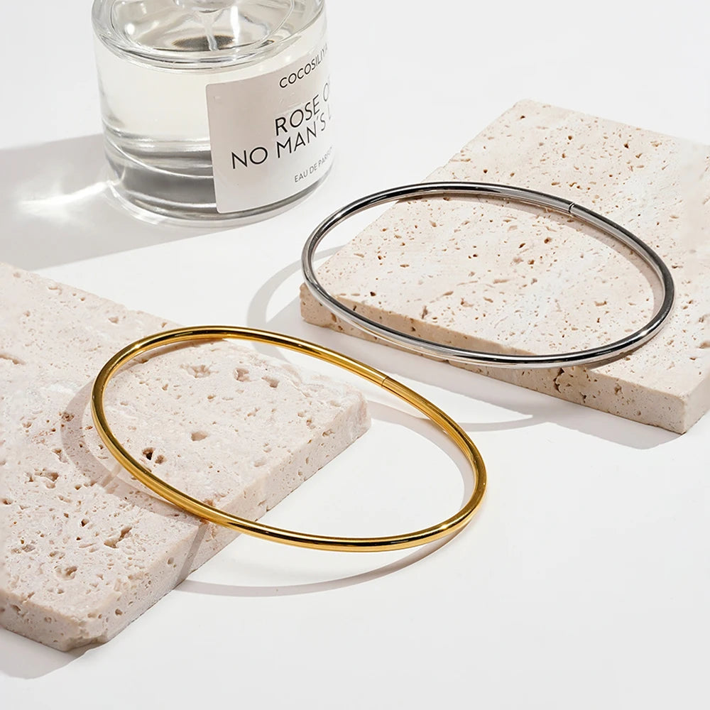 Tobillera Doble Banda Dorada Minimalista - Emeraldia Jewelry · Operado por R. E. dos Santos LTDA · CNPJ: 45.450.979/0001-38