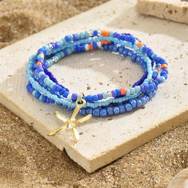 Tobillera Multicapa Estrella de Mar Verano Boho - Emeraldia Jewelry · Operado por R. E. dos Santos LTDA · CNPJ: 45.450.979/0001-38
