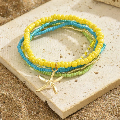 Tobillera Multicapa Estrella de Mar Verano Boho - Emeraldia Jewelry · Operado por R. E. dos Santos LTDA · CNPJ: 45.450.979/0001-38