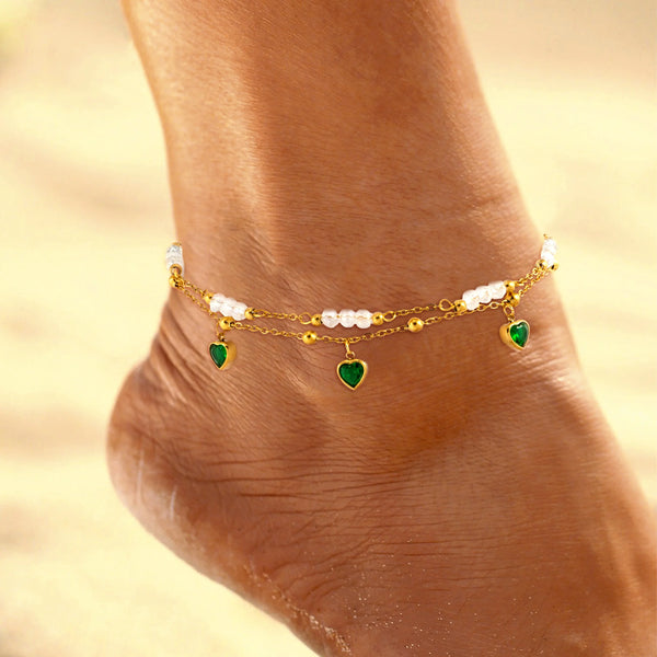 Tobillera Multicapa Corazón Esmeralda y Cristales - Emeraldia Jewelry · Operado por R. E. dos Santos LTDA · CNPJ: 45.450.979/0001-38