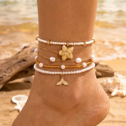 Tobillera Multicapa Estrella de Mar Verano Boho - Emeraldia Jewelry · Operado por R. E. dos Santos LTDA · CNPJ: 45.450.979/0001-38