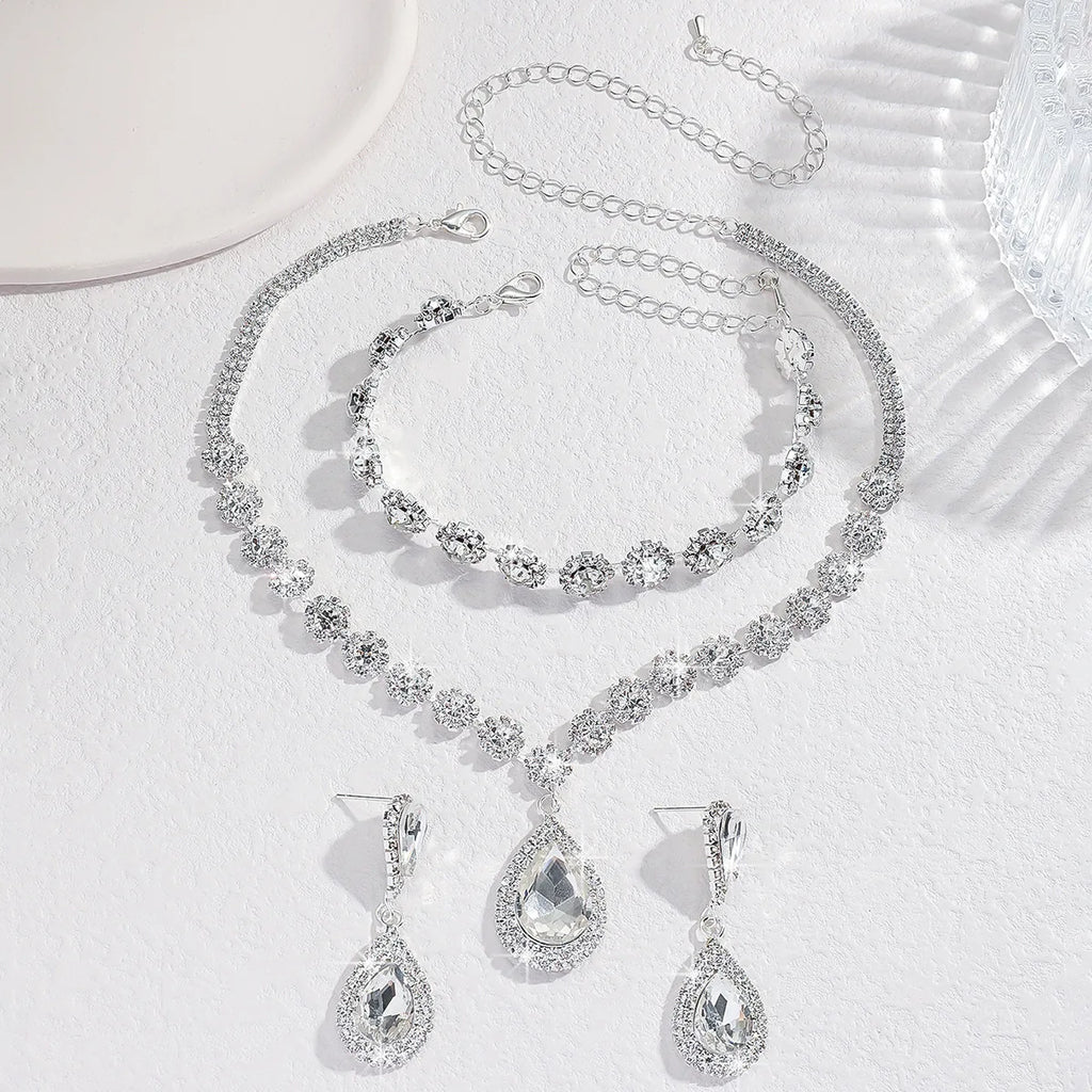 Sapphire Blue Teardrop Halo Bridal Jewelry Set