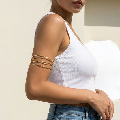 Brazalete de Brazo Abierto Dorado Cruzado Boho - Emeraldia Jewelry · Operado por R. E. dos Santos LTDA · CNPJ: 45.450.979/0001-38