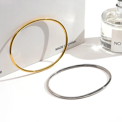 Tobillera Doble Banda Dorada Minimalista - Emeraldia Jewelry · Operado por R. E. dos Santos LTDA · CNPJ: 45.450.979/0001-38