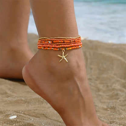 Tobillera Multicapa Estrella de Mar Verano Boho - Emeraldia Jewelry · Operado por R. E. dos Santos LTDA · CNPJ: 45.450.979/0001-38