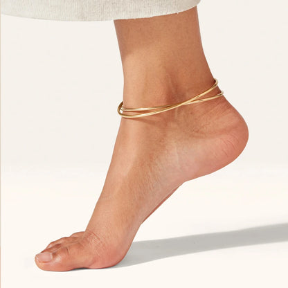 Tobillera Doble Banda Dorada Minimalista - Emeraldia Jewelry · Operado por R. E. dos Santos LTDA · CNPJ: 45.450.979/0001-38
