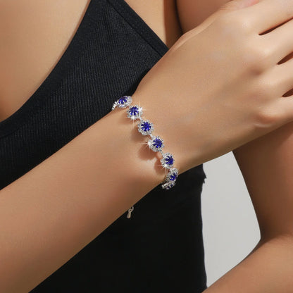 Conjunto de Joyería Nupcial Halo Azul Zafiro en Lágrima - Emeraldia Jewelry · Operado por R. E. dos Santos LTDA · CNPJ: 45.450.979/0001-38