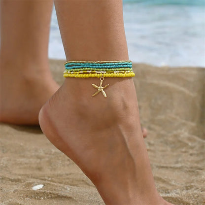 Tobillera Multicapa Estrella de Mar Verano Boho - Emeraldia Jewelry · Operado por R. E. dos Santos LTDA · CNPJ: 45.450.979/0001-38