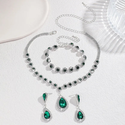 Conjunto de Joyería Nupcial Halo Azul Zafiro en Lágrima - Emeraldia Jewelry · Operado por R. E. dos Santos LTDA · CNPJ: 45.450.979/0001-38
