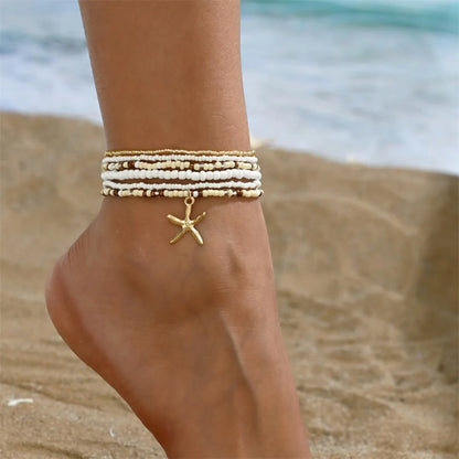Tobillera Multicapa Estrella de Mar Verano Boho - Emeraldia Jewelry · Operado por R. E. dos Santos LTDA · CNPJ: 45.450.979/0001-38
