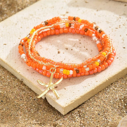 Tobillera Multicapa Estrella de Mar Verano Boho - Emeraldia Jewelry · Operado por R. E. dos Santos LTDA · CNPJ: 45.450.979/0001-38