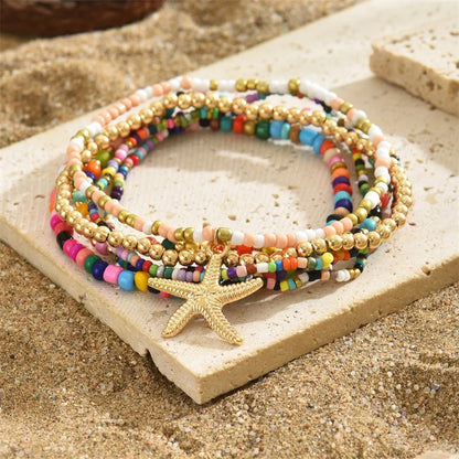 Tobillera Multicapa Estrella de Mar Verano Boho - Emeraldia Jewelry · Operado por R. E. dos Santos LTDA · CNPJ: 45.450.979/0001-38