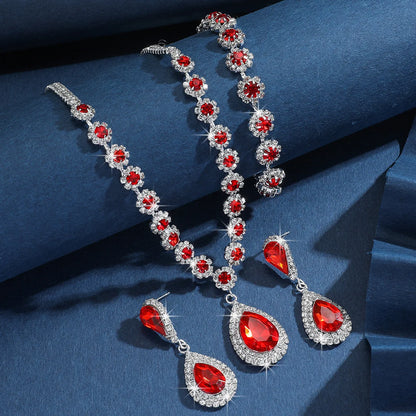 Conjunto de Joyería Nupcial Halo Azul Zafiro en Lágrima - Emeraldia Jewelry · Operado por R. E. dos Santos LTDA · CNPJ: 45.450.979/0001-38