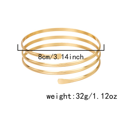 Brazalete de Brazo Abierto Dorado Cruzado Boho - Emeraldia Jewelry · Operado por R. E. dos Santos LTDA · CNPJ: 45.450.979/0001-38