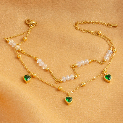 Tobillera Multicapa Corazón Esmeralda y Cristales - Emeraldia Jewelry · Operado por R. E. dos Santos LTDA · CNPJ: 45.450.979/0001-38